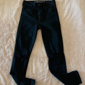 Distressed black jeans